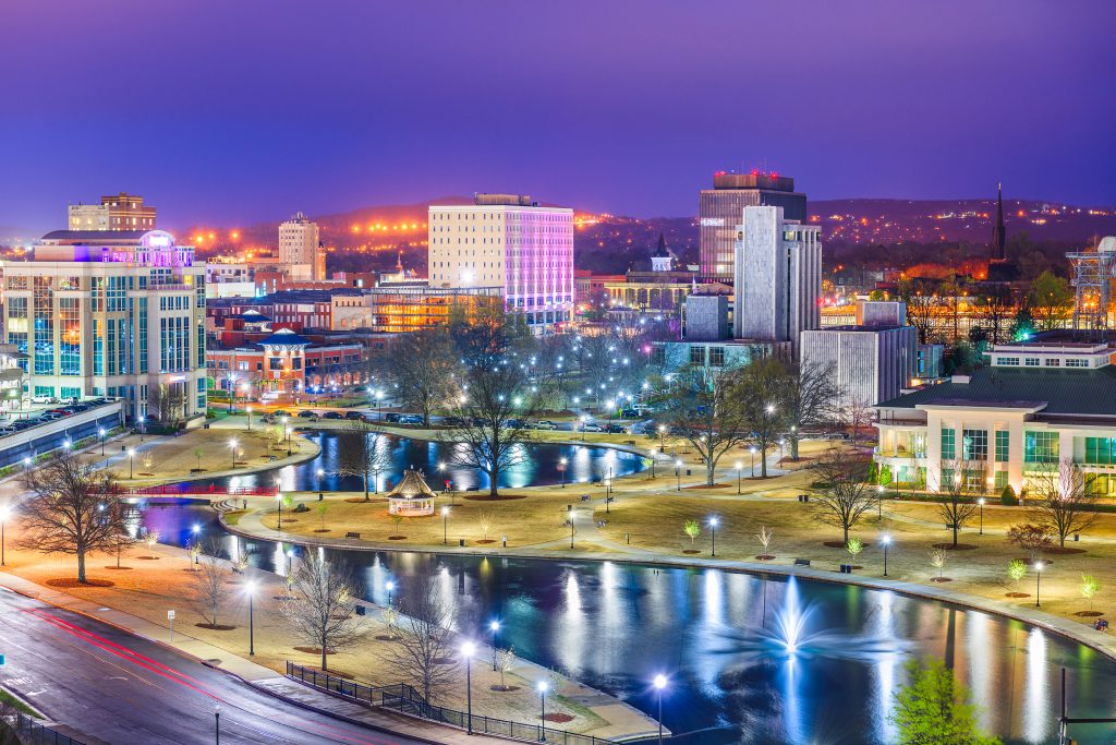 Night time view of downtown cityscape in Huntsville, AL